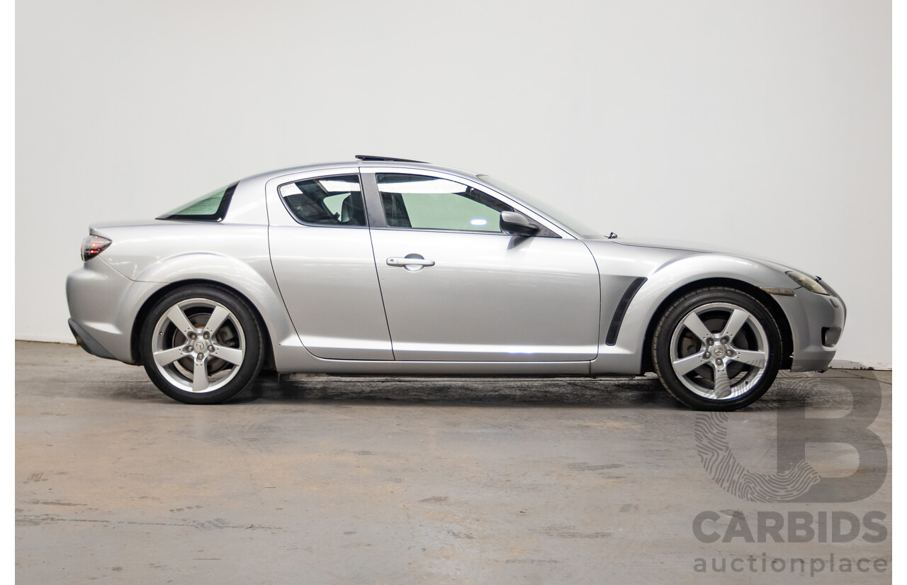 9/2005 Mazda RX-8 FE Series 1 4d Coupe Sunlight Silver Metallic 1.3L