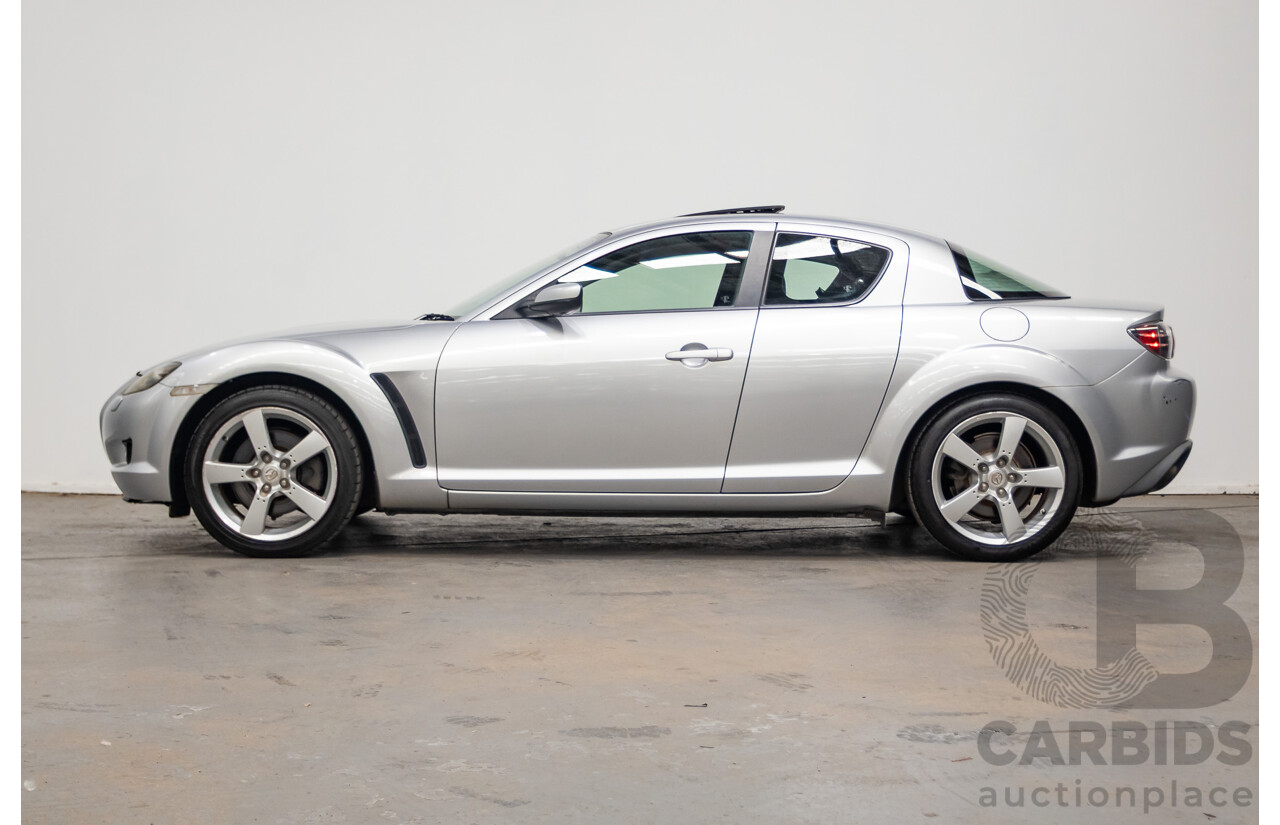 9/2005 Mazda RX-8 FE Series 1 4d Coupe Sunlight Silver Metallic 1.3L