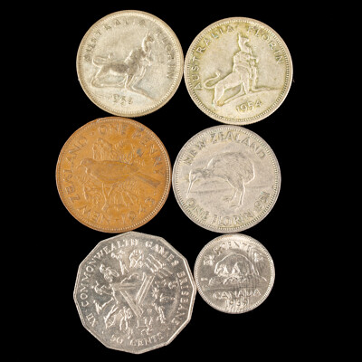 Two Australian Silver QE2 Florins, 1954 Commemorative, 1982 Fifty Cent, Canada 1939 Five Cents, New Zealand 1951 Florin and 1943 Penny