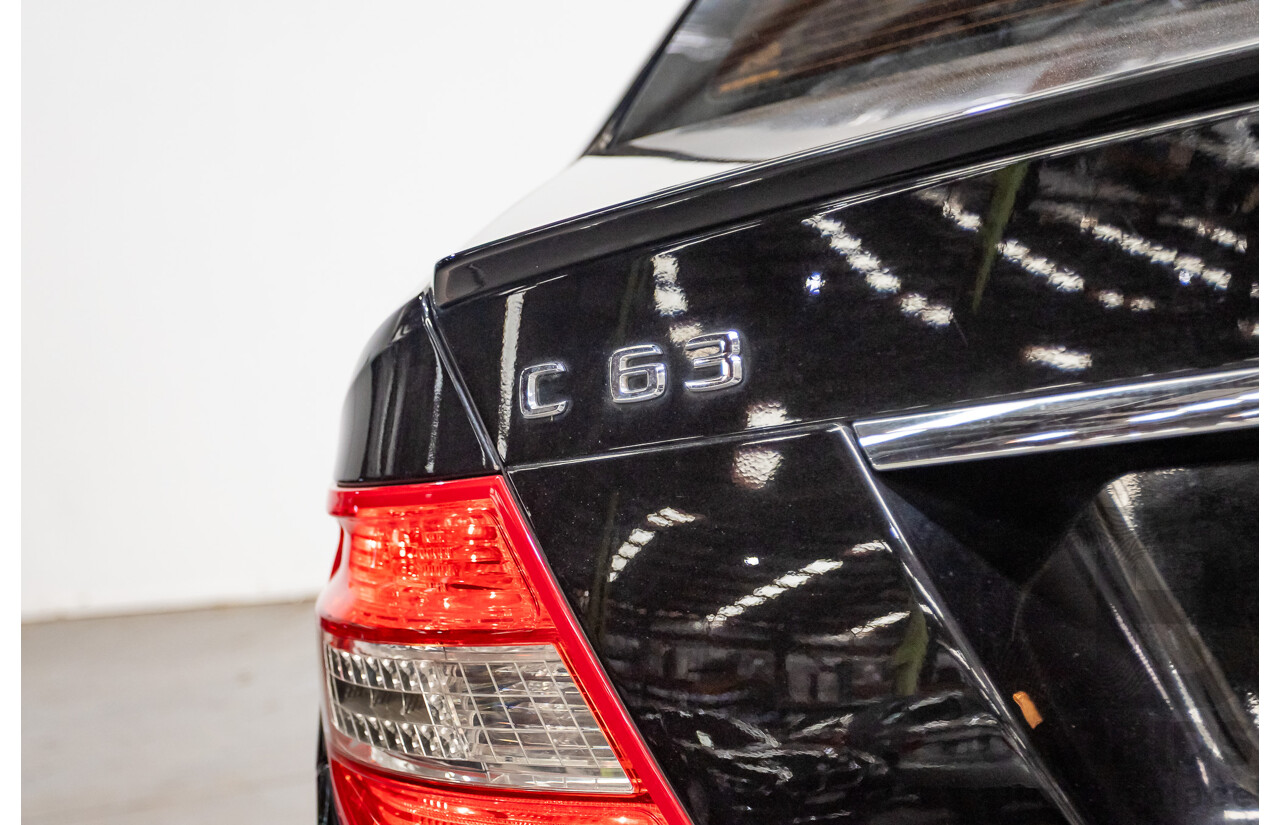 03/2009 Mercedes-Benz C63 AMG W204 4D Sedan Obsidian Black Metallic V8 6.2L