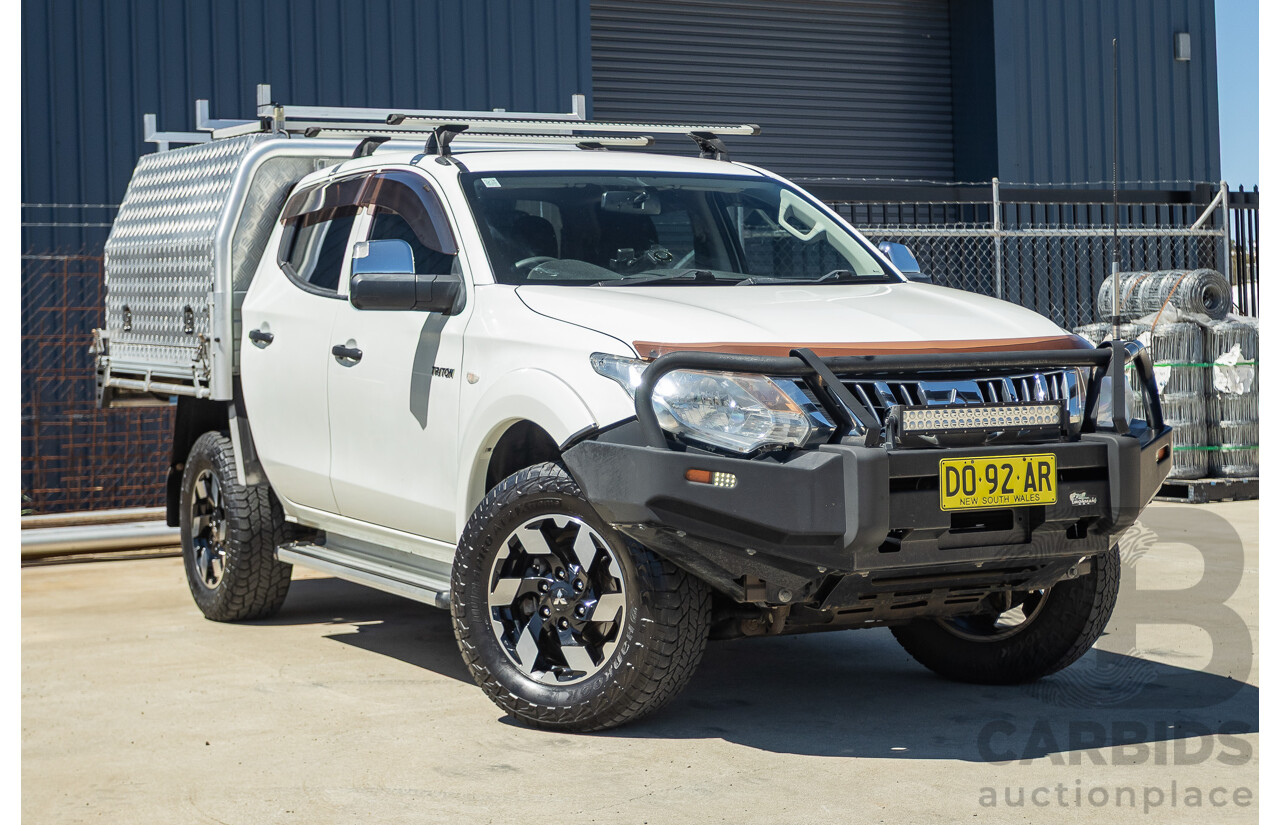 02/2016 Mitsubishi Triton GLX (4x4) MQ MY16 UPGRADE Dual Cab Utility White Turbo Diesel 2.4L