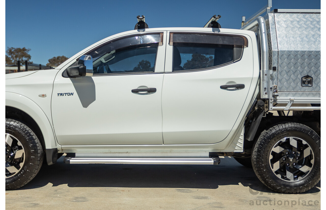 02/2016 Mitsubishi Triton GLX (4x4) MQ MY16 UPGRADE Dual Cab Utility White Turbo Diesel 2.4L