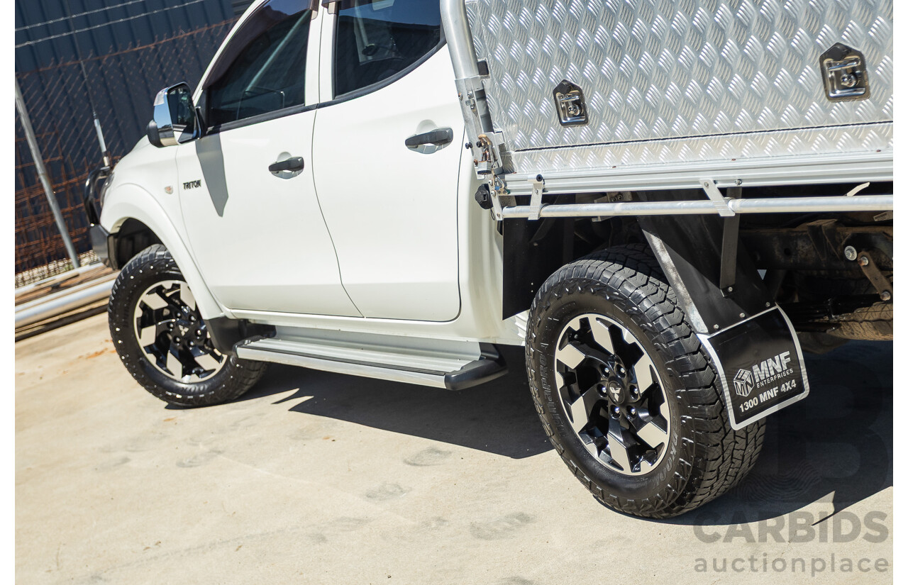 02/2016 Mitsubishi Triton GLX (4x4) MQ MY16 UPGRADE Dual Cab Utility White Turbo Diesel 2.4L