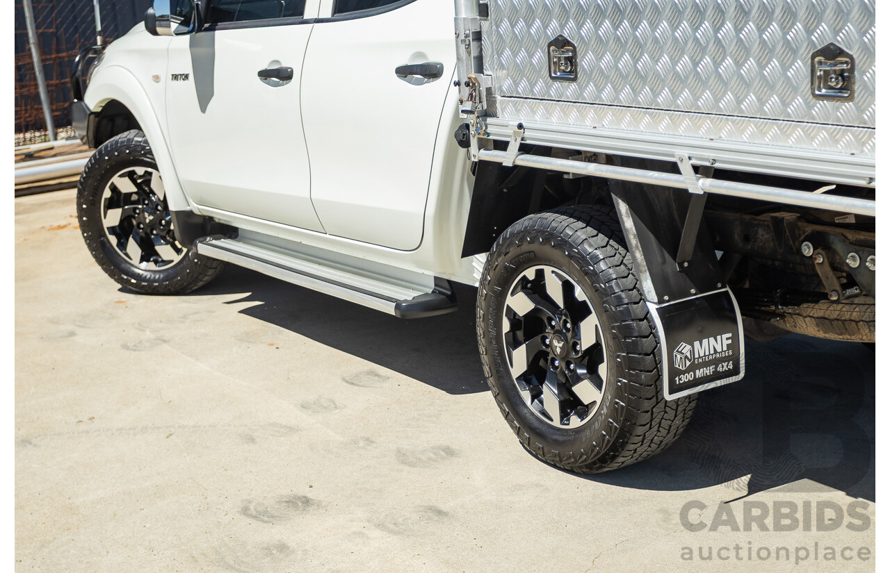 02/2016 Mitsubishi Triton GLX (4x4) MQ MY16 UPGRADE Dual Cab Utility White Turbo Diesel 2.4L