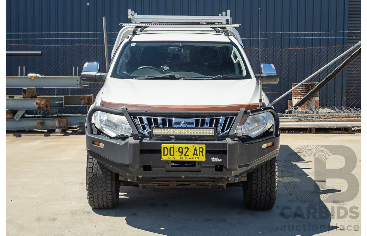 02/2016 Mitsubishi Triton GLX (4x4) MQ MY16 UPGRADE Dual Cab Utility White Turbo Diesel 2.4L