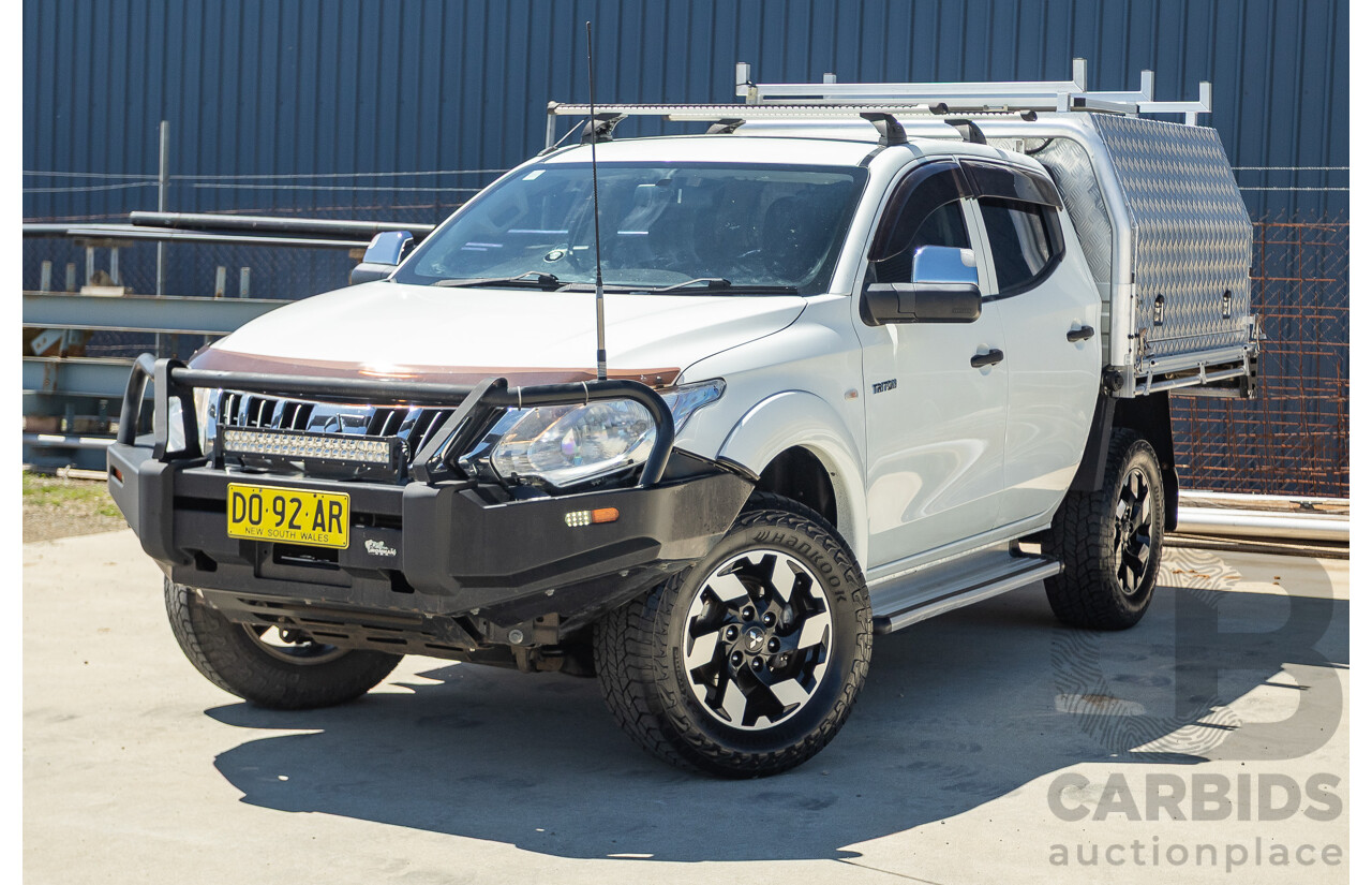 02/2016 Mitsubishi Triton GLX (4x4) MQ MY16 UPGRADE Dual Cab Utility White Turbo Diesel 2.4L