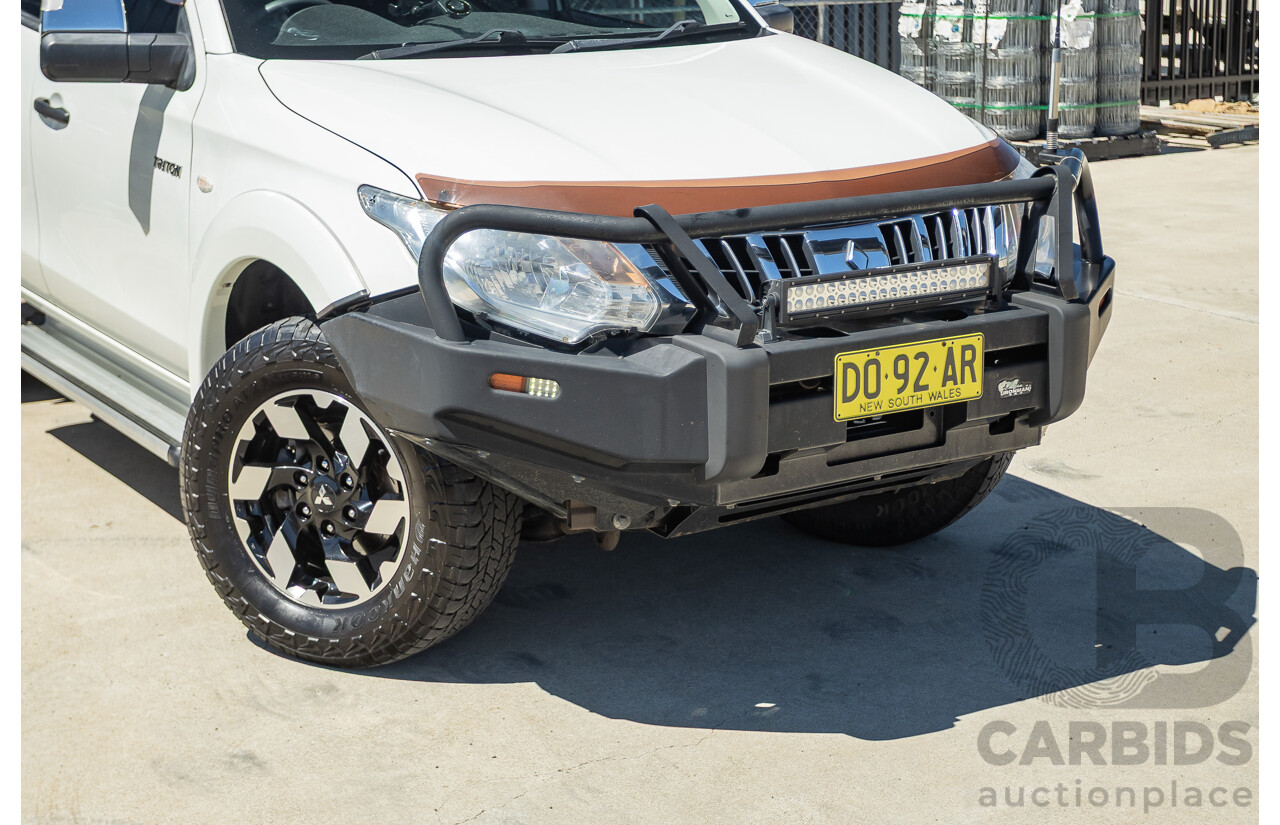 02/2016 Mitsubishi Triton GLX (4x4) MQ MY16 UPGRADE Dual Cab Utility White Turbo Diesel 2.4L