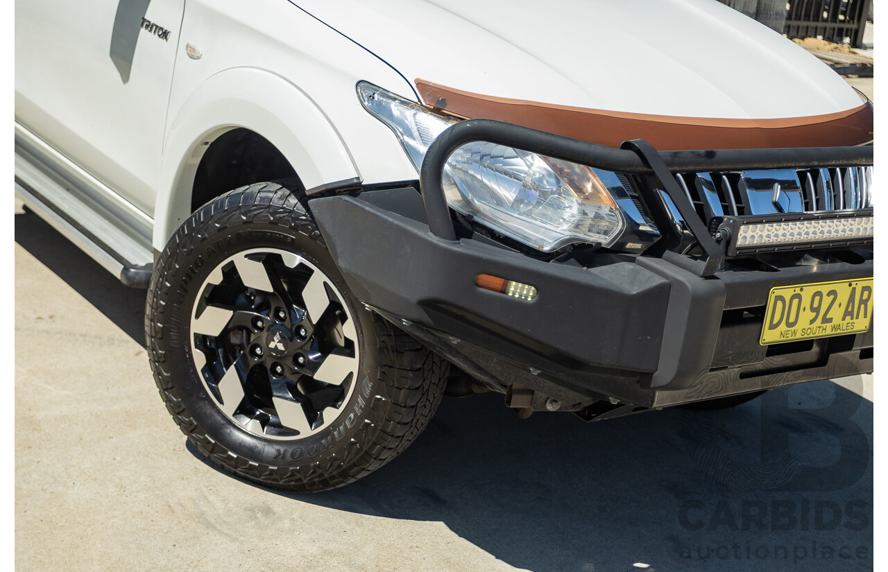 02/2016 Mitsubishi Triton GLX (4x4) MQ MY16 UPGRADE Dual Cab Utility White Turbo Diesel 2.4L