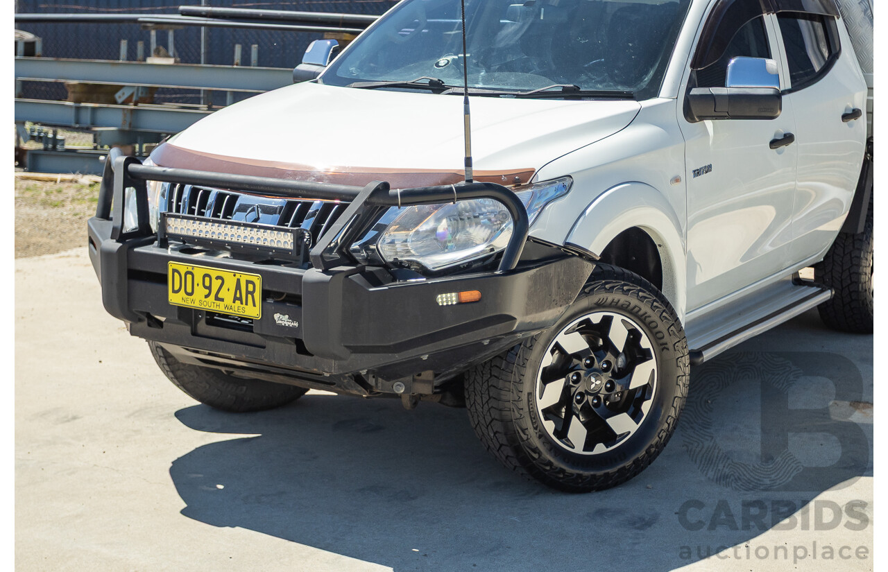 02/2016 Mitsubishi Triton GLX (4x4) MQ MY16 UPGRADE Dual Cab Utility White Turbo Diesel 2.4L