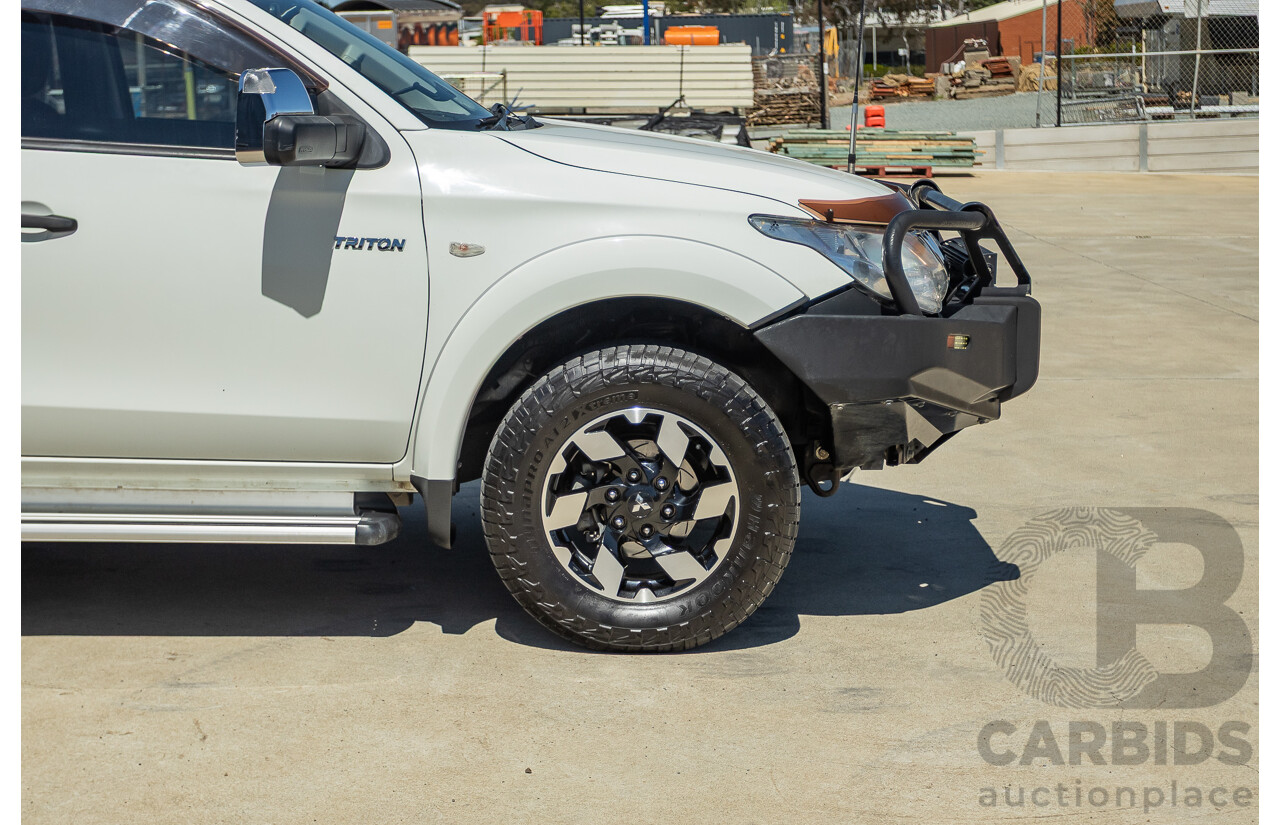 02/2016 Mitsubishi Triton GLX (4x4) MQ MY16 UPGRADE Dual Cab Utility White Turbo Diesel 2.4L