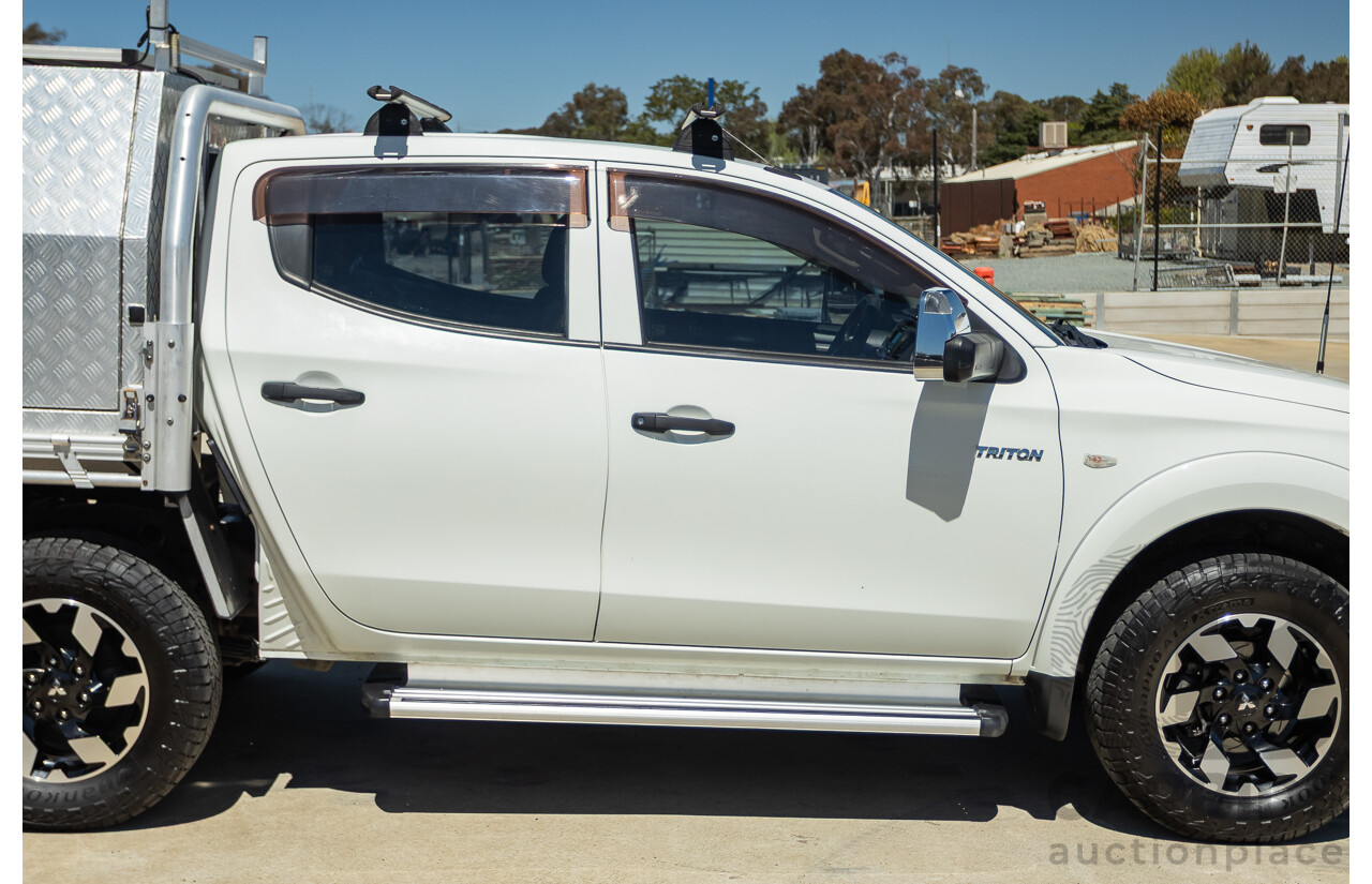 02/2016 Mitsubishi Triton GLX (4x4) MQ MY16 UPGRADE Dual Cab Utility White Turbo Diesel 2.4L
