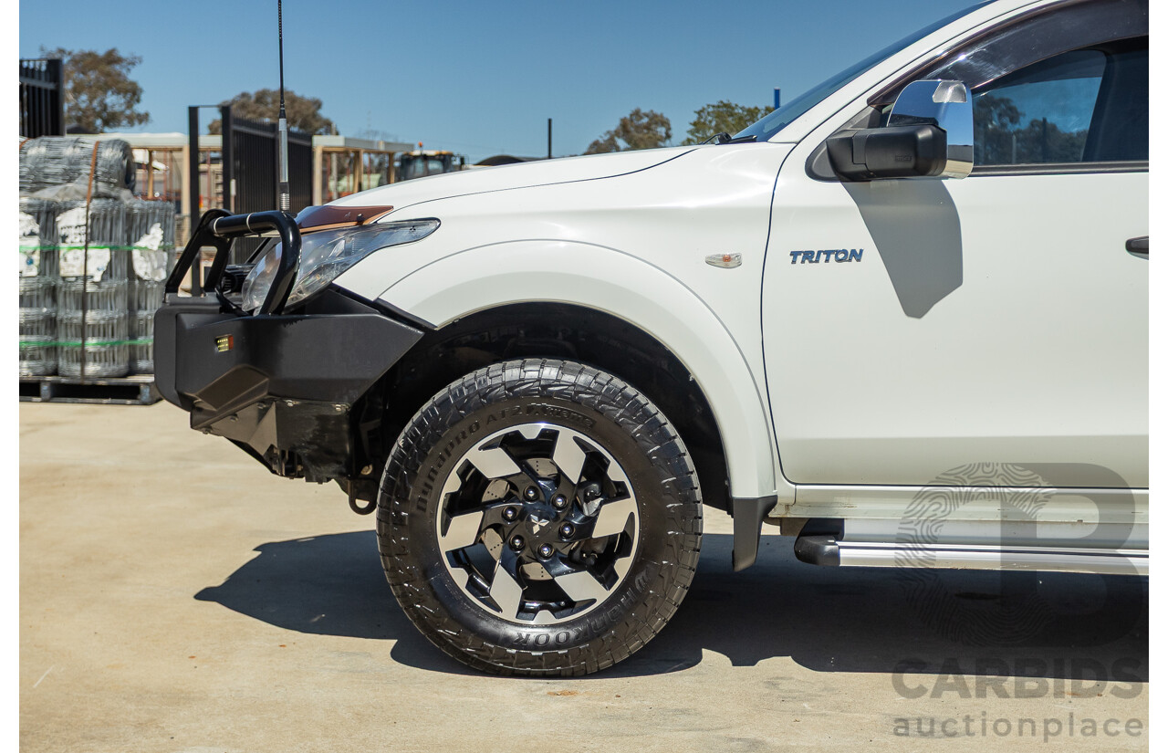 02/2016 Mitsubishi Triton GLX (4x4) MQ MY16 UPGRADE Dual Cab Utility White Turbo Diesel 2.4L