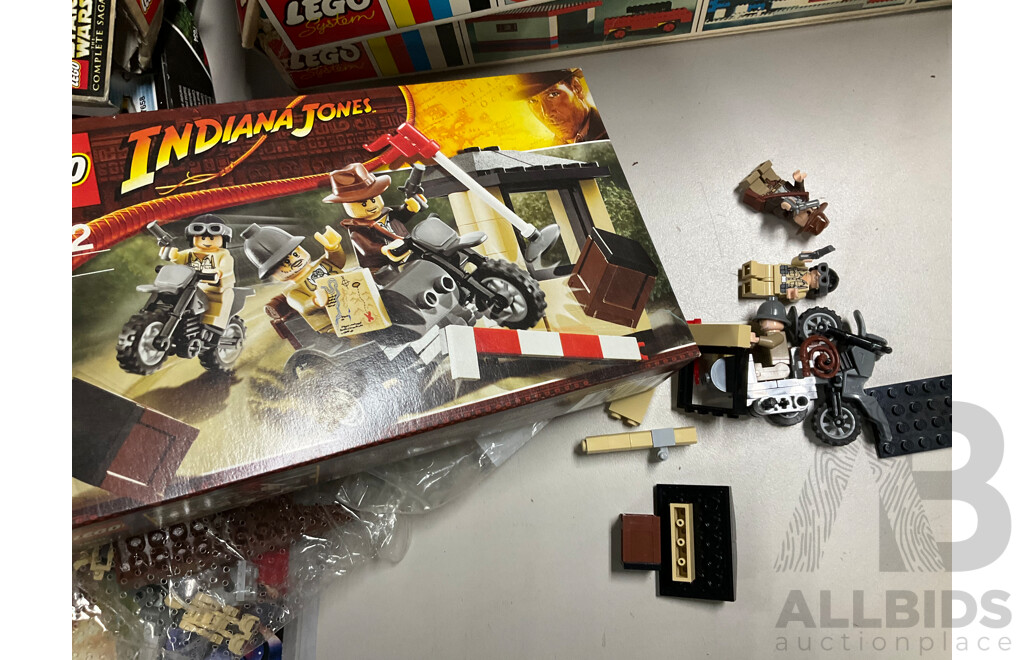 Collection of Assorted Lego Pieces and Boxes Including Star Wars Train, Instruction Manuals and More