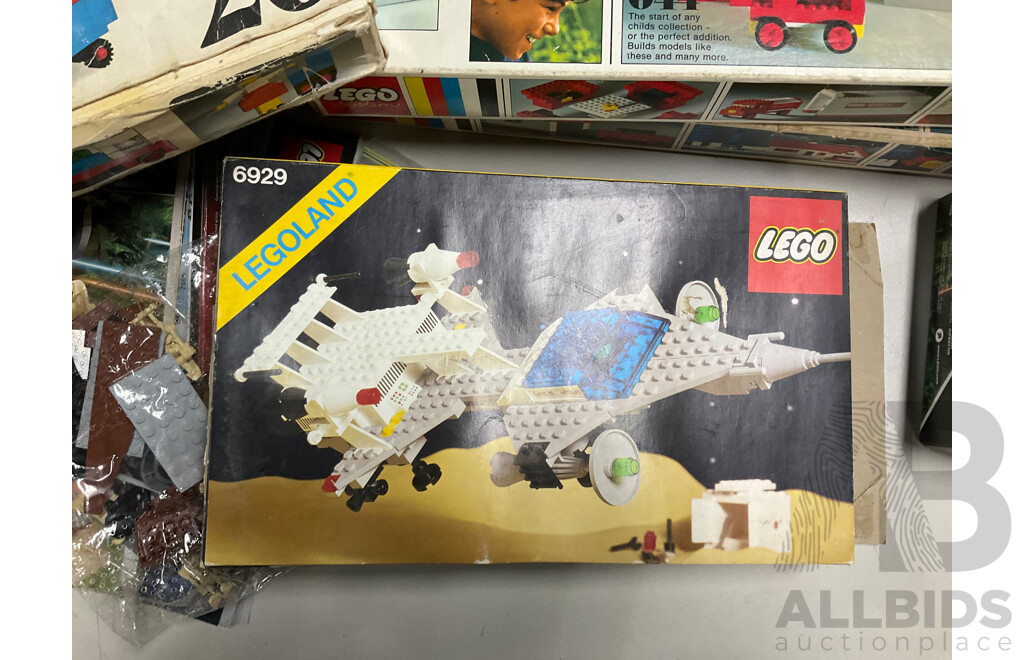 Collection of Assorted Lego Pieces and Boxes Including Star Wars Train, Instruction Manuals and More
