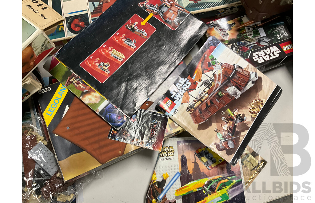 Collection of Assorted Lego Pieces and Boxes Including Star Wars Train, Instruction Manuals and More