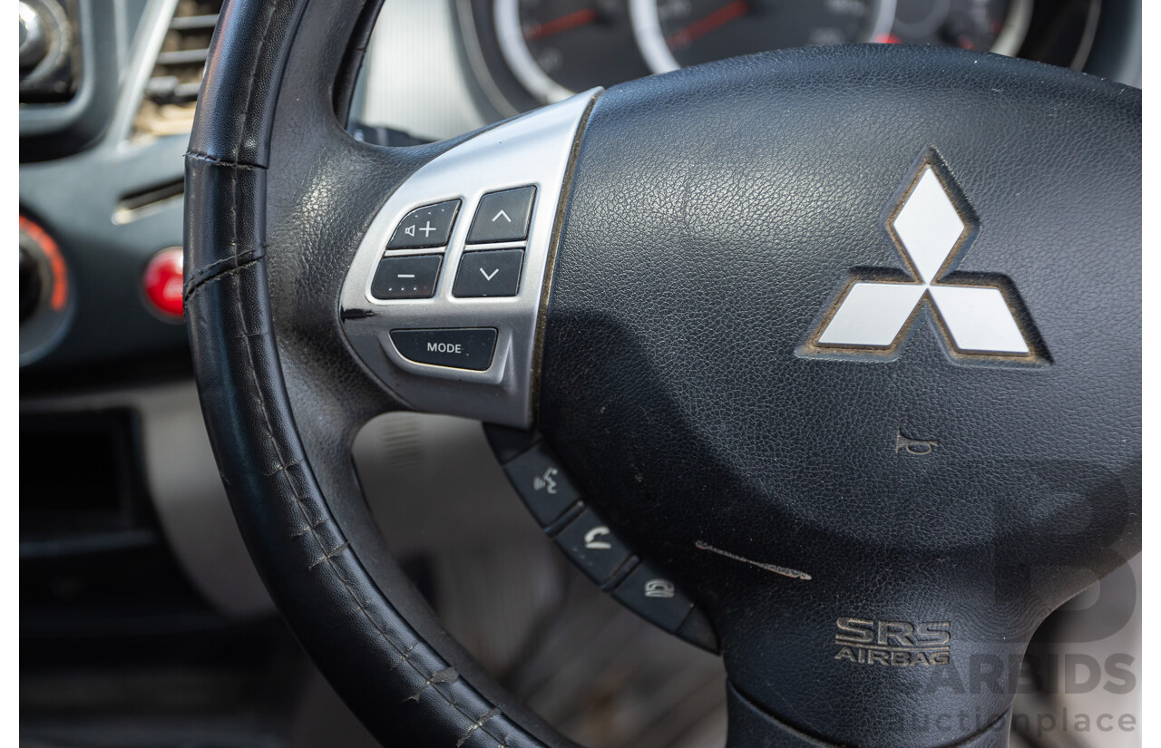 3/2015 Mitsubishi Triton GLX MN (4x4) MY15 Double Cab Utility Cool Silver Metallic Turbo Diesel 2.5L