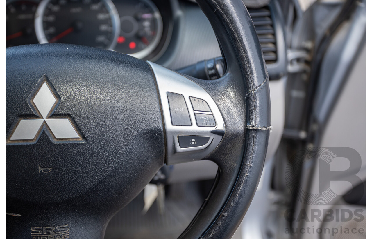 3/2015 Mitsubishi Triton GLX MN (4x4) MY15 Double Cab Utility Cool Silver Metallic Turbo Diesel 2.5L