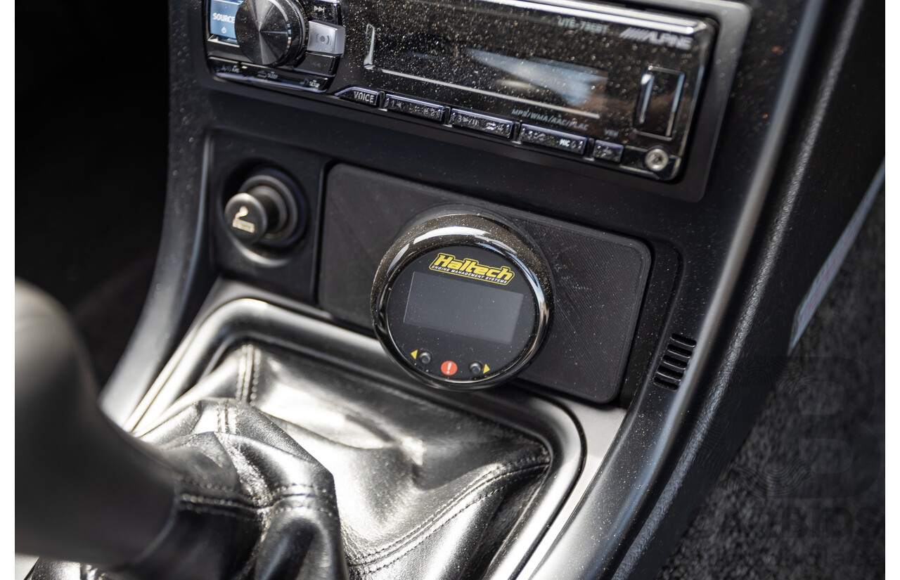 11/1989 Nissan Skyline GT-R Series 1 (AWD) BNR32 2d Coupe Silver Single Turbo 2.8L - Modified 493kw