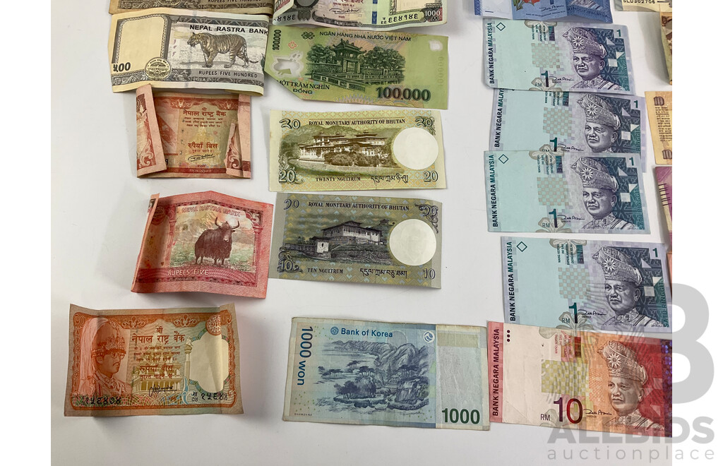 Collection of International Banknotes Including Korea, Vietnam, Bhutan, Ghana, Nepal, Indonesia, India, Malaysia
