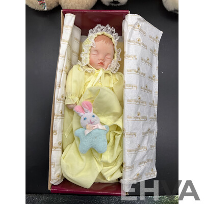 ASHTON DRAKE Porcelain Baby Doll ''Little Bit of Sunshine'', Tambo Teddies Bear and CocaCola Plush Polar Bear and Meerkat Plush Toy - Lot of 4