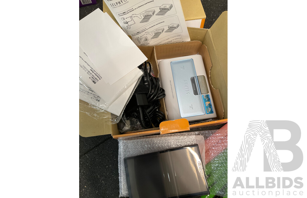 CANON Selphy Photo Printer with Accesories, SONY Digital Camera, Assorted DVD's, 3D Sync Transmitter and More