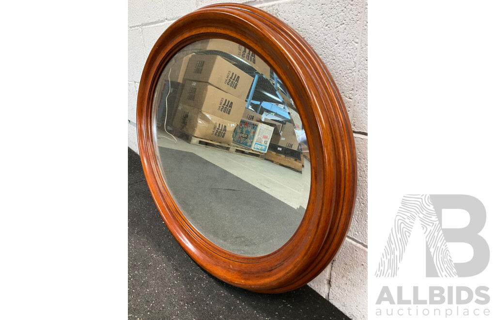 Oval Wall Mirror with a Wooden Frame
