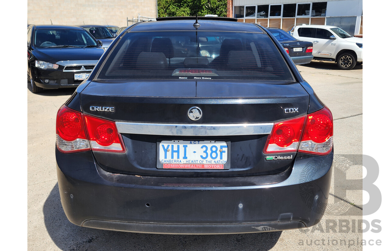 3/2011 Holden Cruze CDX JG 4d Sedan Black 2.0L