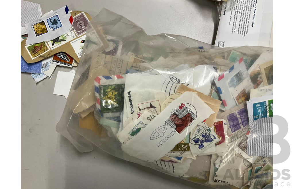 Collection of International Cancelled Stamps Including USA, New Zealand, Australia, UK, Germany, Malaysia, India, Romania, Italy and More - Approximately Two Kilograms