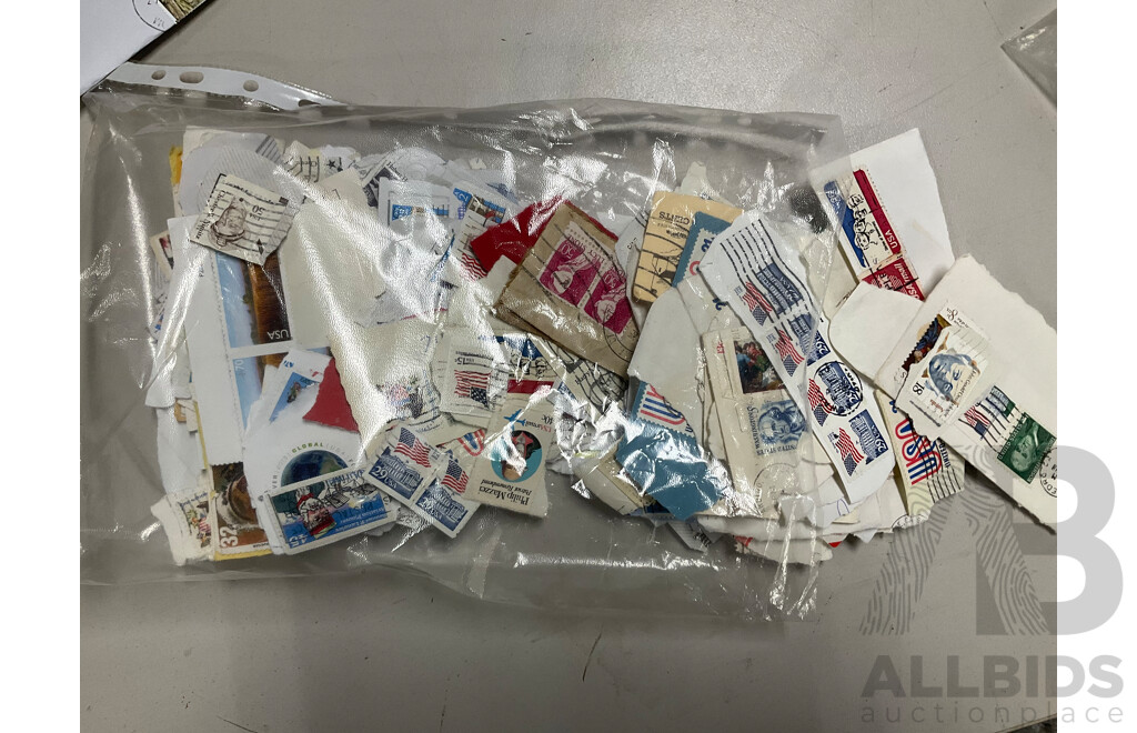 Collection of International Cancelled Stamps Including USA, New Zealand, Australia, UK, Germany, Malaysia, India, Romania, Italy and More - Approximately Two Kilograms