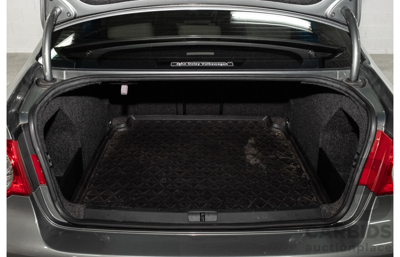 12/2006 Volkswagen Passat 2.0 TDI 3C 4d Sedan Granite Green Metallic Turbo Diesel 2.0L