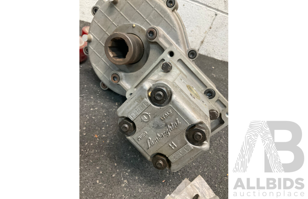 Collection of Hydraulic Agricultural Parts, Including Lamborighini Pump and Geardbox Assembly