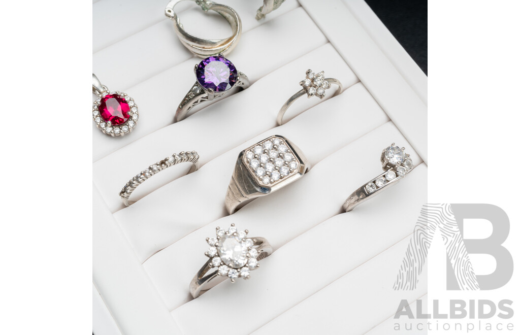 Collection of (6) Sterling Silver Rings, with a Pendant & Pair of Hoop Earrings, 22.62 Grams