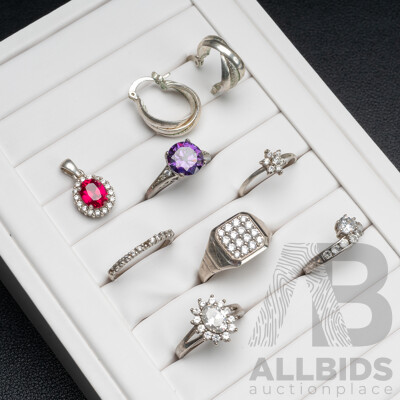Collection of (6) Sterling Silver Rings, with a Pendant & Pair of Hoop Earrings, 22.62 Grams
