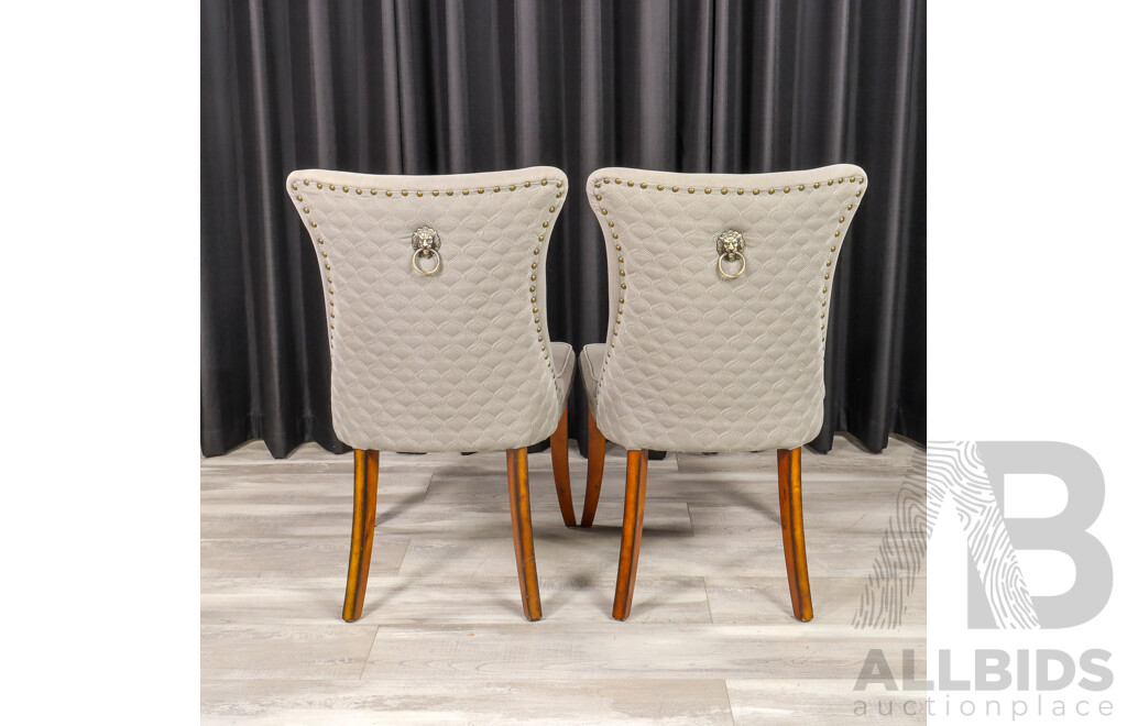 Pair of Upholstered Dining Chairs with Lion Knocker Medalion to Rear