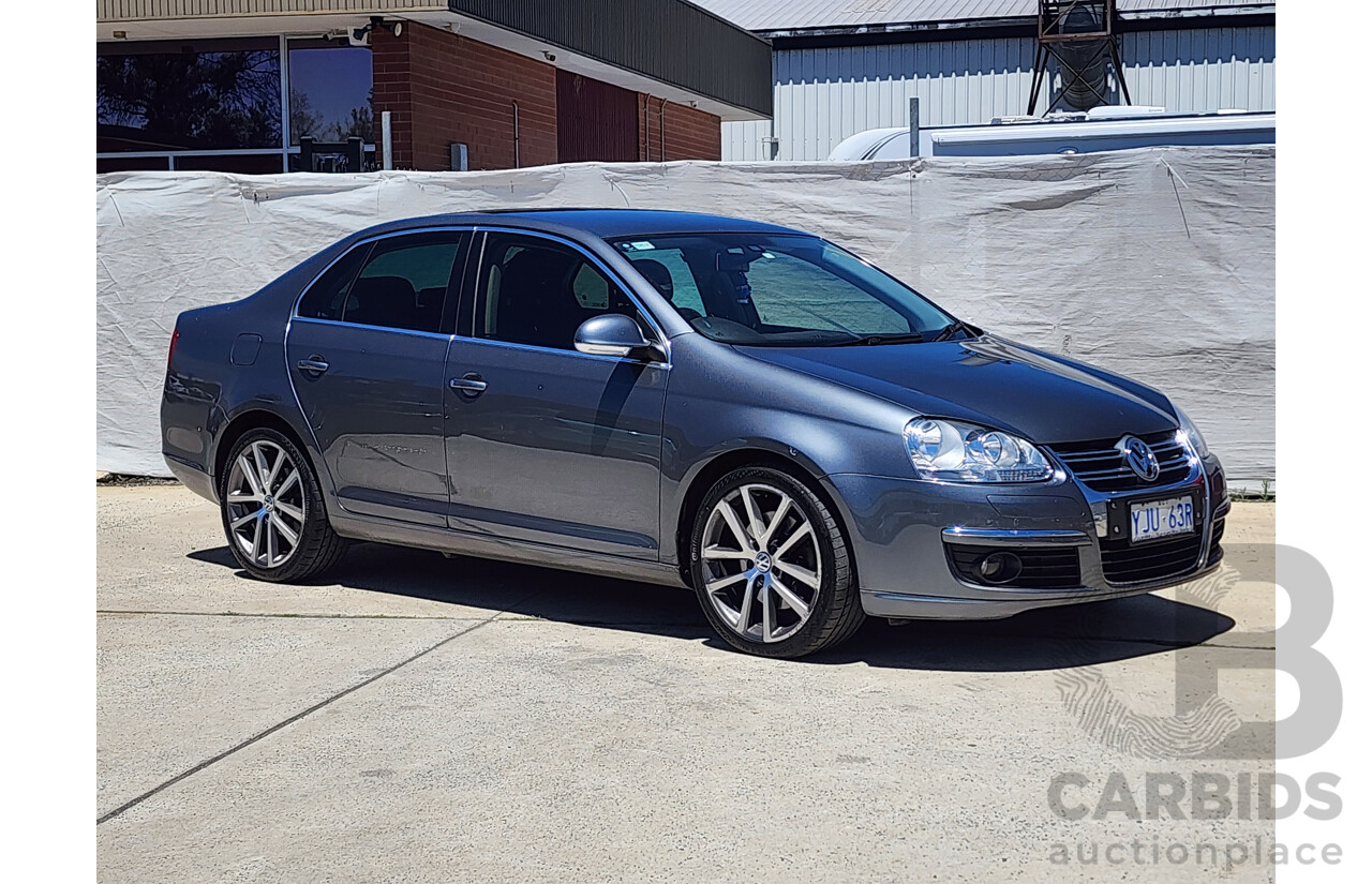 9/2010 Volkswagen Jetta 125 TDI Highline 1KM MY10 4d Sedan Grey 2.0L