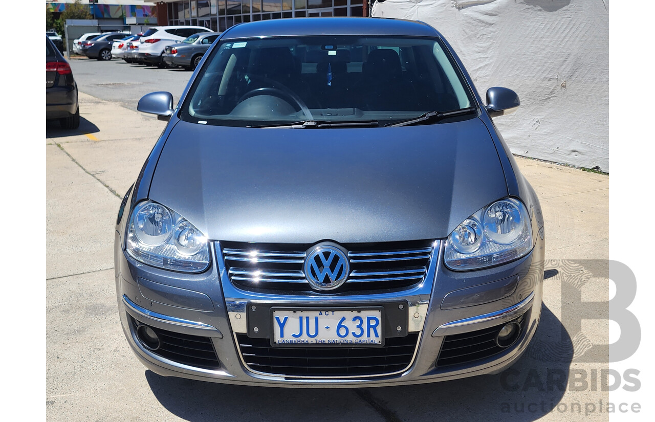 9/2010 Volkswagen Jetta 125 TDI Highline 1KM MY10 4d Sedan Grey 2.0L