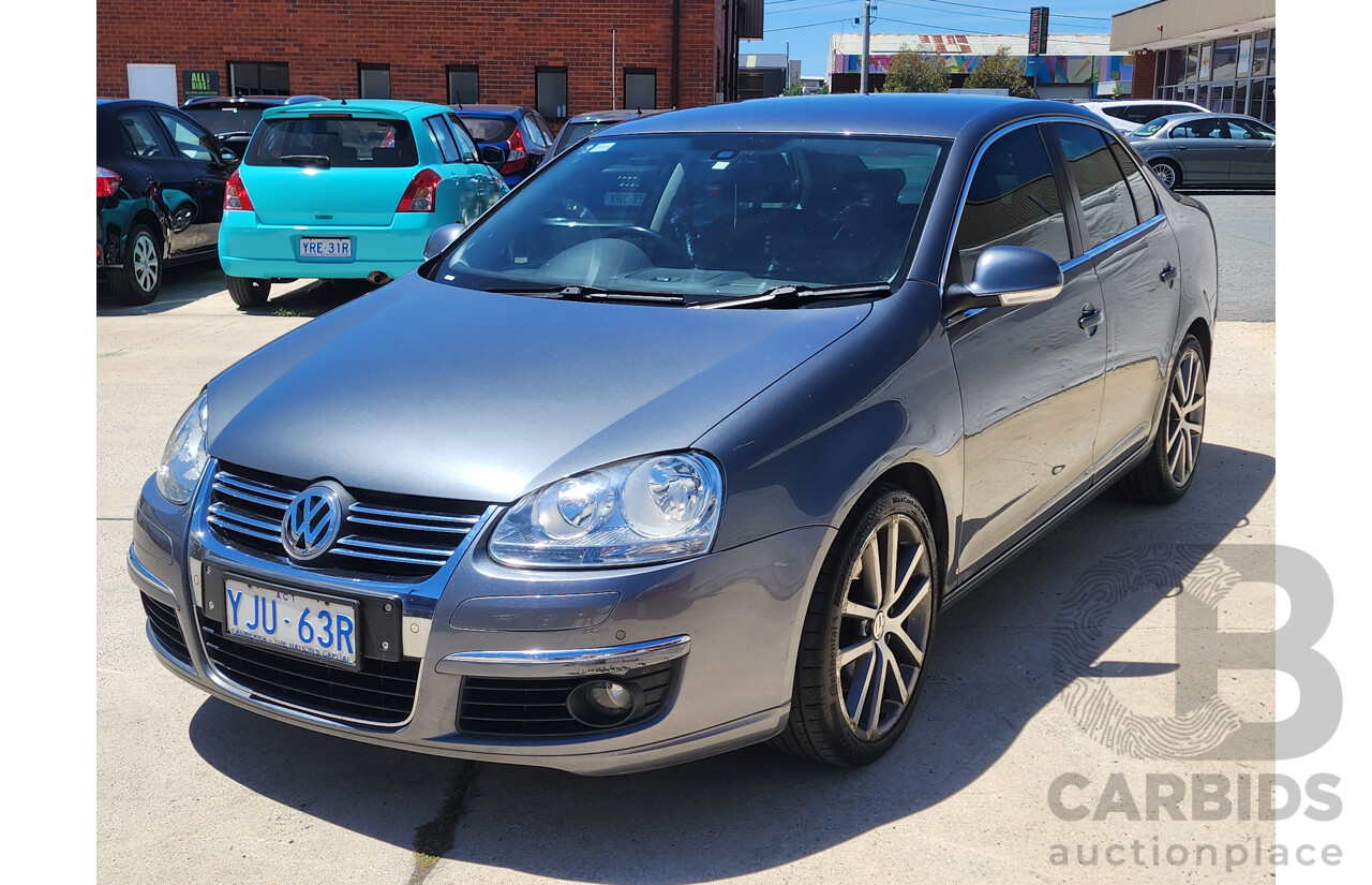 9/2010 Volkswagen Jetta 125 TDI Highline 1KM MY10 4d Sedan Grey 2.0L