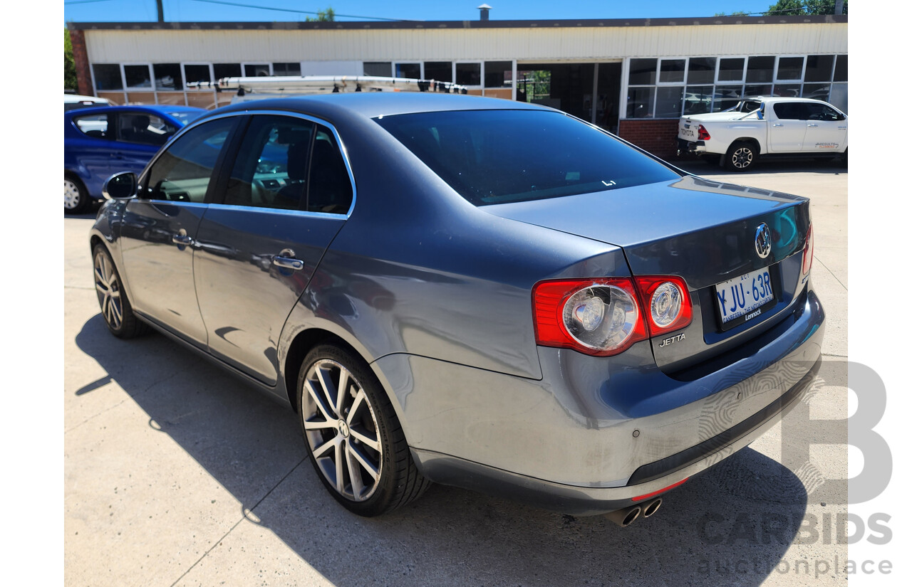9/2010 Volkswagen Jetta 125 TDI Highline 1KM MY10 4d Sedan Grey 2.0L