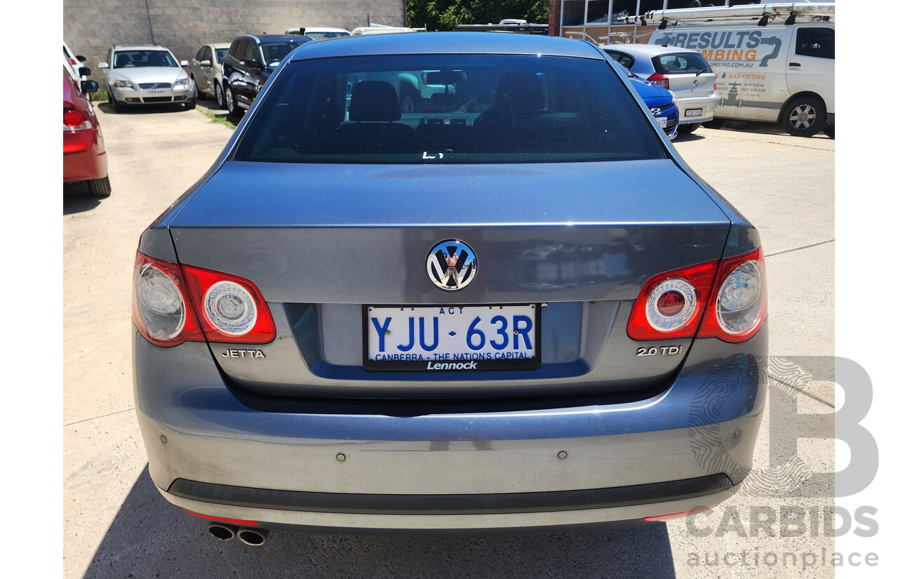 9/2010 Volkswagen Jetta 125 TDI Highline 1KM MY10 4d Sedan Grey 2.0L