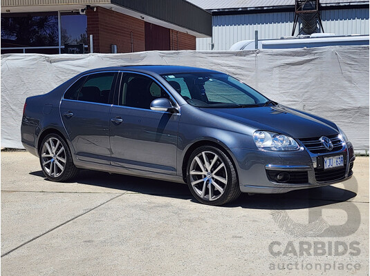 9/2010 Volkswagen Jetta 125 TDI Highline 1KM MY10 4d Sedan Grey 2.0L