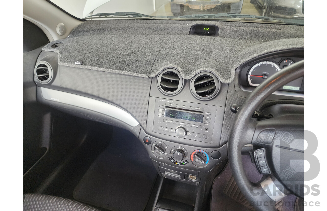 9/2011 Holden Barina  TK MY11 5d Hatchback White 1.6L