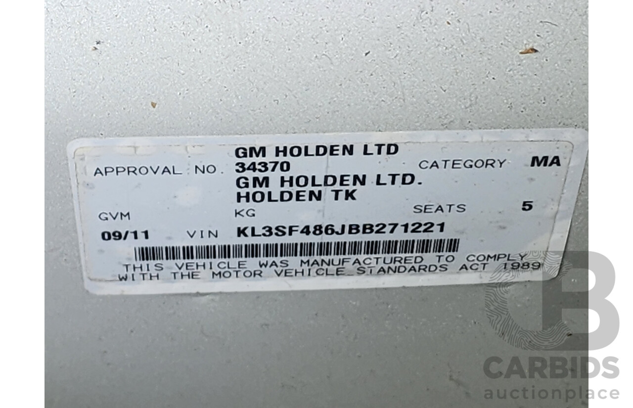 9/2011 Holden Barina  TK MY11 5d Hatchback White 1.6L