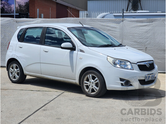 9/2011 Holden Barina  TK MY11 5d Hatchback White 1.6L