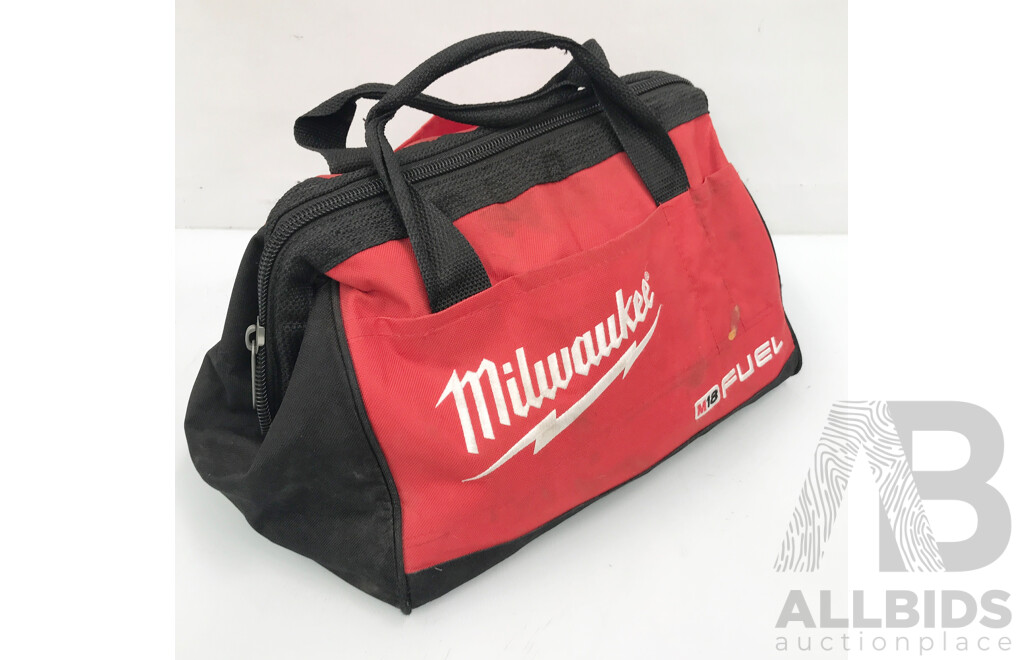 Milwaukee Tool Bag with Various Tools Such as Wrenches, Spanners, and More