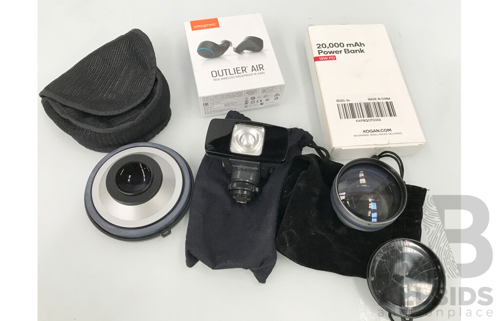 Creative Outlier Air Wireless Earphones, Kogan Power Bank, and Assorted Sony Camera Lenses and Video Light