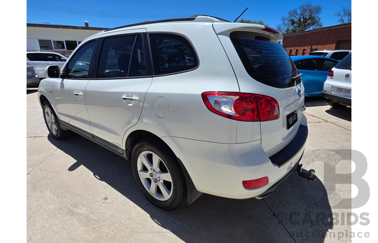 9/2009 Hyundai Santa Fe Elite CRDi (4x4) CM MY09 UPGRADE 4d Wagon White Turbo Diesel 2.2L