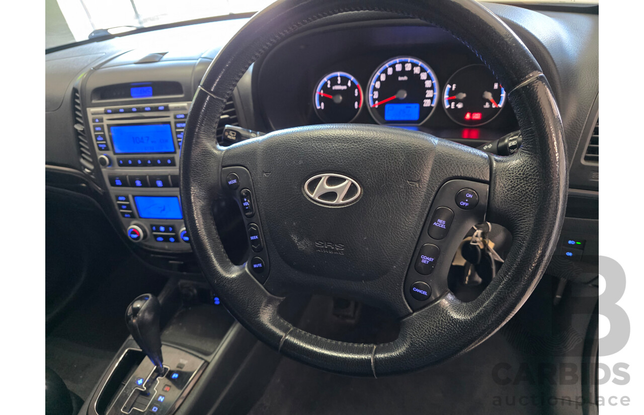 9/2009 Hyundai Santa Fe Elite CRDi (4x4) CM MY09 UPGRADE 4d Wagon White Turbo Diesel 2.2L