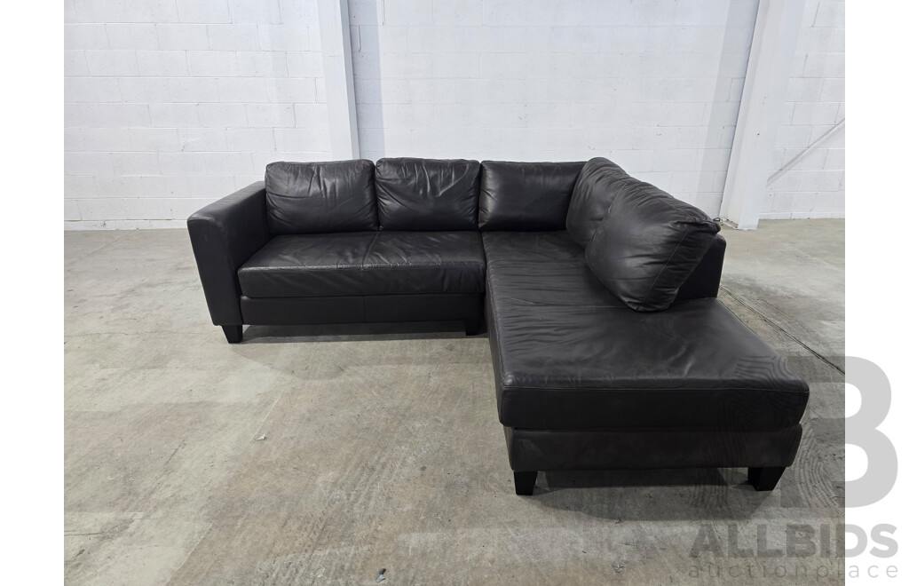 Brown Leather Lounge with Chase