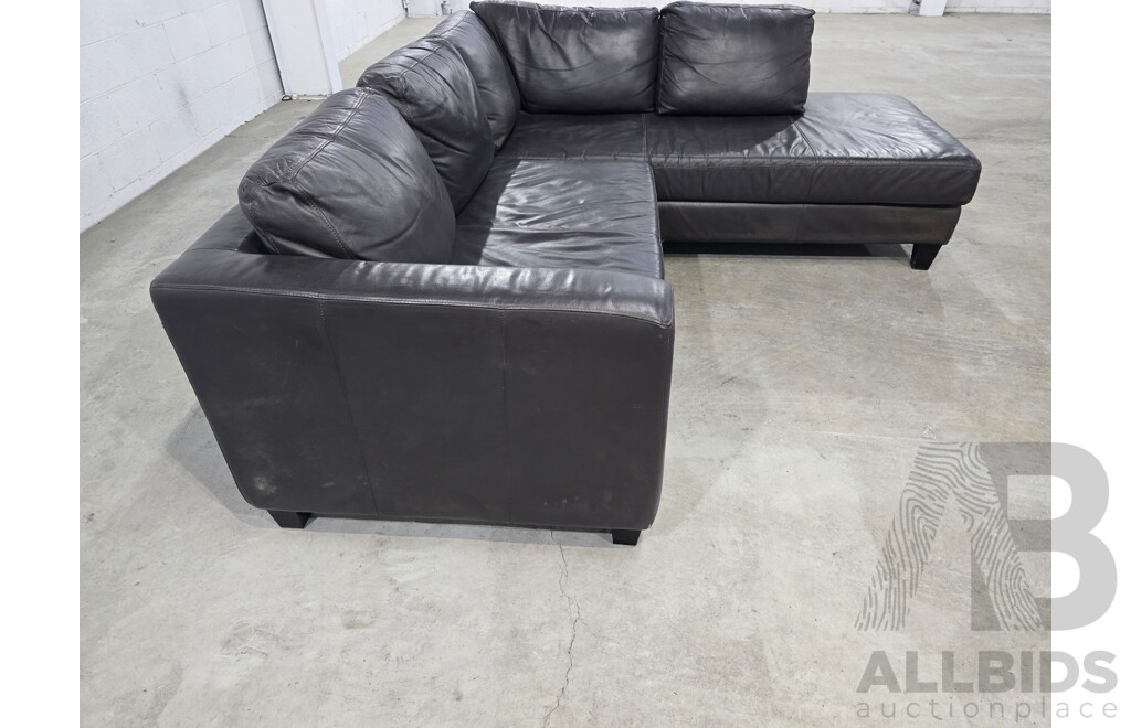 Brown Leather Lounge with Chase