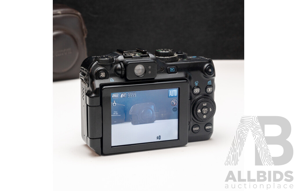 FujiFilm X-E1 Digital Camera with Fujinon Aspherical Super EBC XF 18–55mm F/2.8–4 Lens and Charger, with Canon PowerShot G11 Digital Camera with Leather Case and Charger